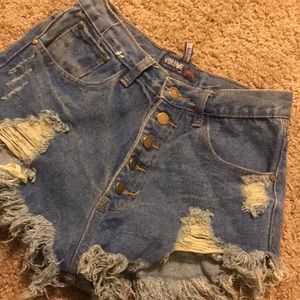 Medium wash booty denim shorts